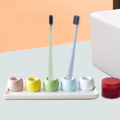 Stojan na zubní kartáčky Mini keramický stojan na zubní kartáčky Dutý design víceúčelový držák na pero pro domácí koupelnu