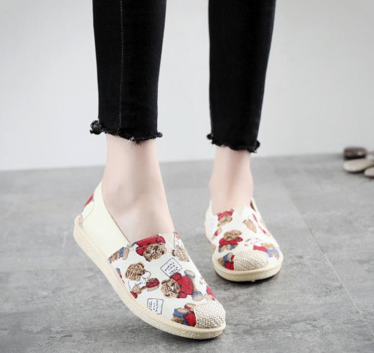 New fashion canvas shoes female student flat white shoes Korean version casual fisherman shoes one pedal lazy shoes