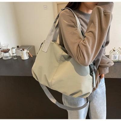 Pevné nylonové jednoduché kabelky přes rameno velkokapacitní volnočasové sportovní podzimní ležérní všestranné tašky v novém stylu