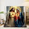 Two figures with glowing halos, sacred hearts, lilies, and radiant light. for all seasons blanket lunch break throw gift