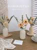 Decoração de casa – Flores e coroas artificiais