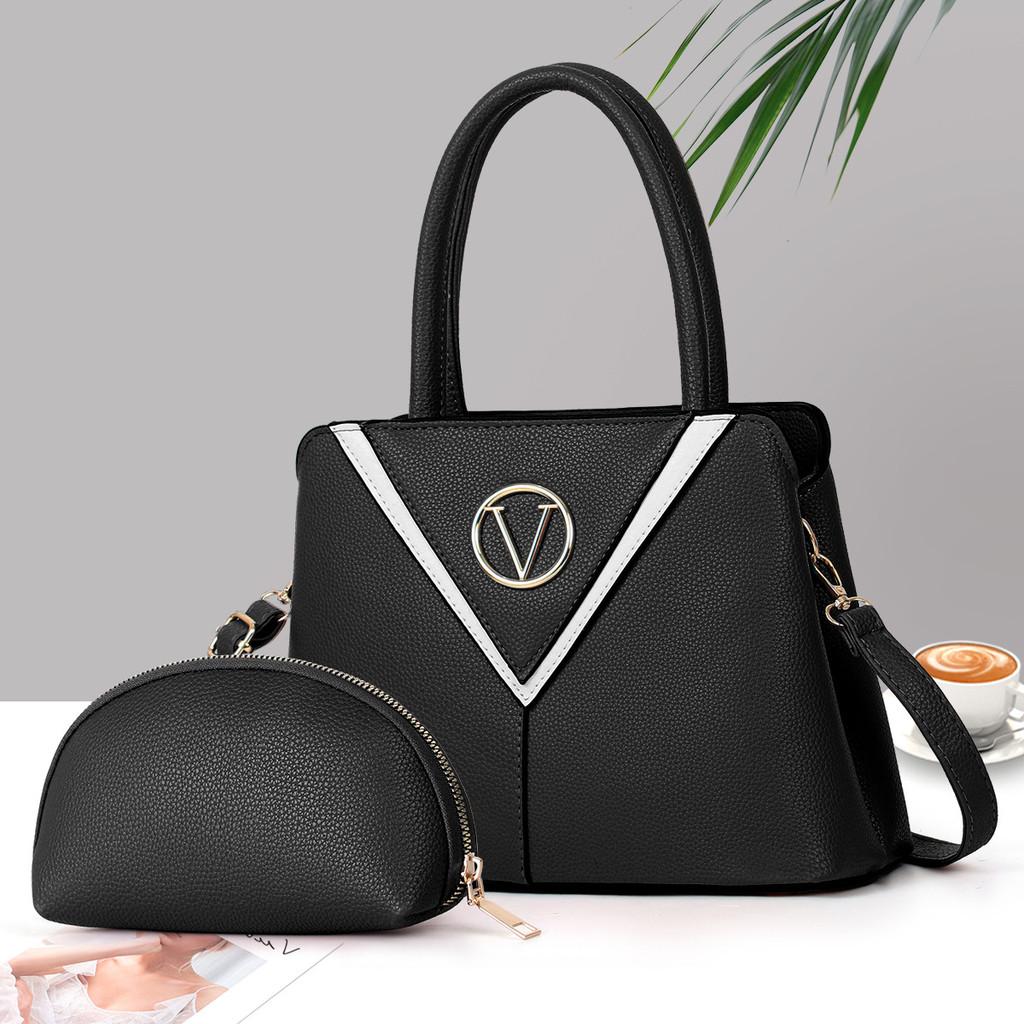 

Стильная плечевая сумка из искусственной кожи с цветными блоками и просторным внутренним отделением для повседневного использования чёрный