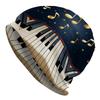 A Unisex Street Style Music-Themed Knitted Hat Featuring an Exquisite Golden Piano Pattern, Made from Durable Knitted Fabric, Providing a Comfortable