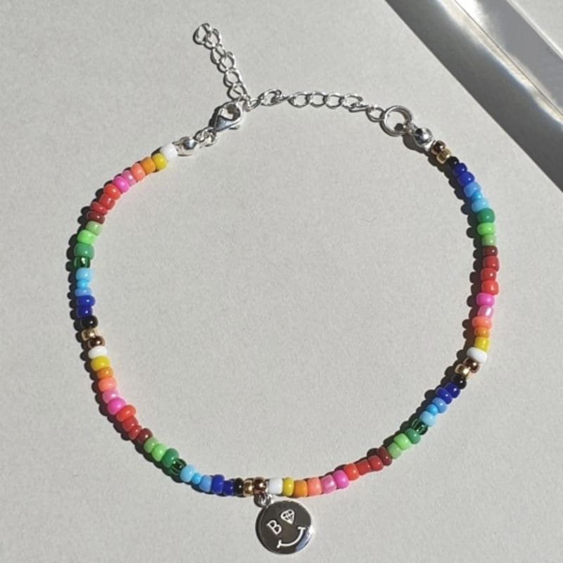 

BONBEAU Smile Coin Exotic Color Bead Bracelet free