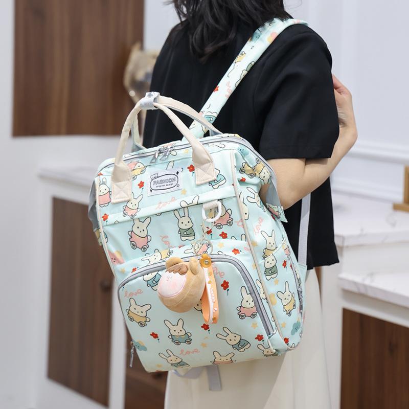 New Fashionable Multi Functional Large Capacity Handheld Backpack for Moms Going Out Lightweight Mother and Baby Bag