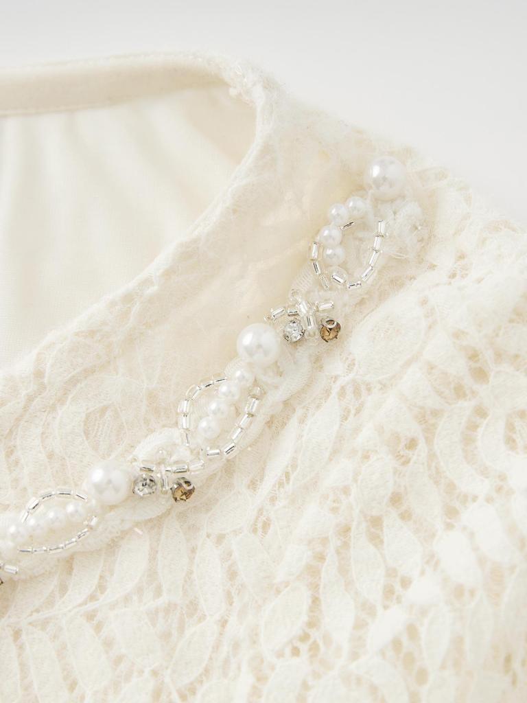 Nanyou Elegantes Französisches Ein-Schulter Perlen-Spitzen-T-Shirt