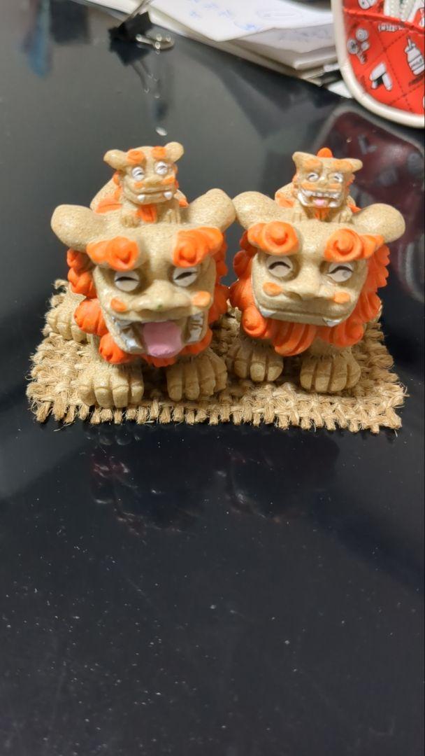 

[USED] Orange ceramic lion dance figurine