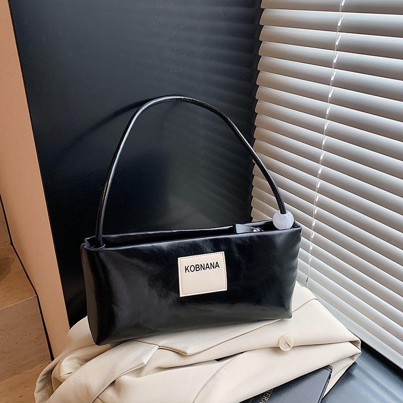 

Новая стильная и простая наплечная сумка-подмышка, женская высококлассная повседневная и универсальная портативная сумка-багет, тренд чёрный