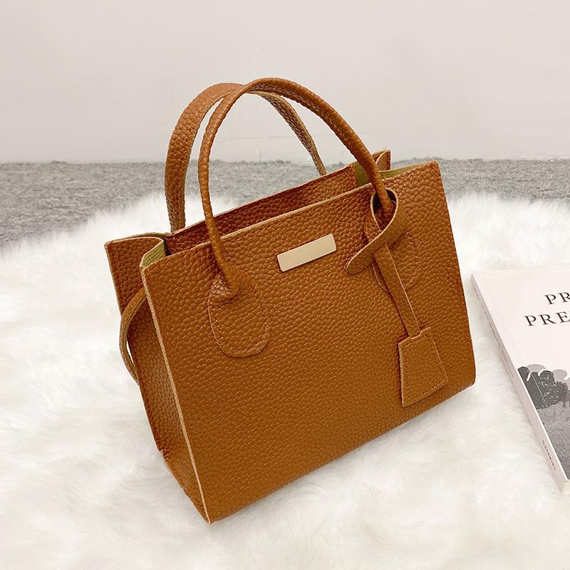 Damenhandtasche, Handytasche, Kosmetiktasche, kleine Einkaufstasche mit Litschi-Muster.