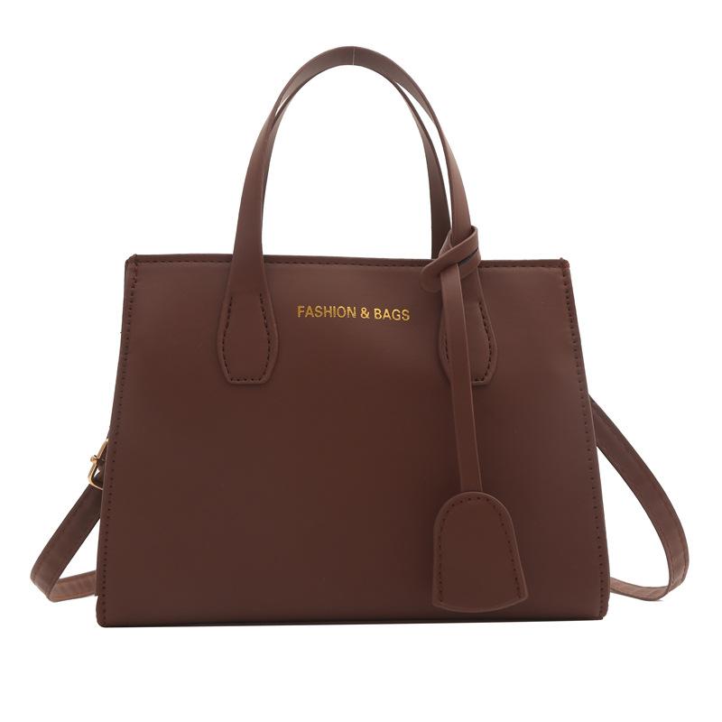 

2024 new temperament fashion design foreign style solid color large capacity zipper texture portable messenger shoulder bag