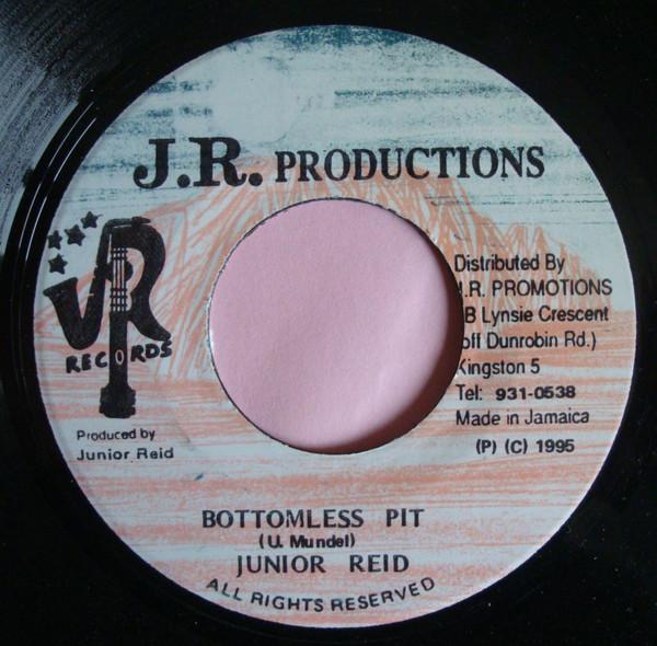 

7-дюймовий запис JUNIOR REID Bottomless Pit NONE J.R. Виробництво 1995 Ямайка Реггі Ска Даб Вживаний