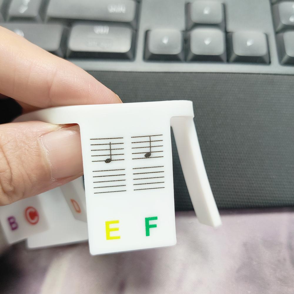 Kleberfreie Silikon-Klaviertastenaufkleber 61/88 Tasten Notenstreifen Notenlinien Musikaufkleber Wiederverwendbares Tastaturzubehör für Kinder Anfänger