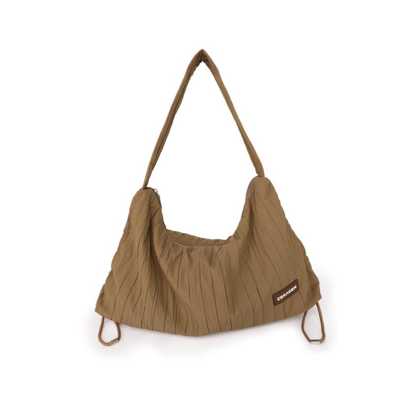 

Wrinkled Armpit Bag, Fashionable Commuting Handbag, Casual Shoulder Dumpling Bag, Available in Six Colors коричневий