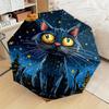 Regenschirm zum Zusammenklappen Der Schirm verfügt über eine große, stilisierte schwarze Katze mit leuchtend gelben Augen vor einem Nachthimmel, verziert mit