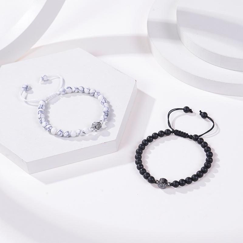 Bracciale con proiezione "Ti amo" in 100 lingue con pietra naturale smerigliata e turchese bianco per coppie