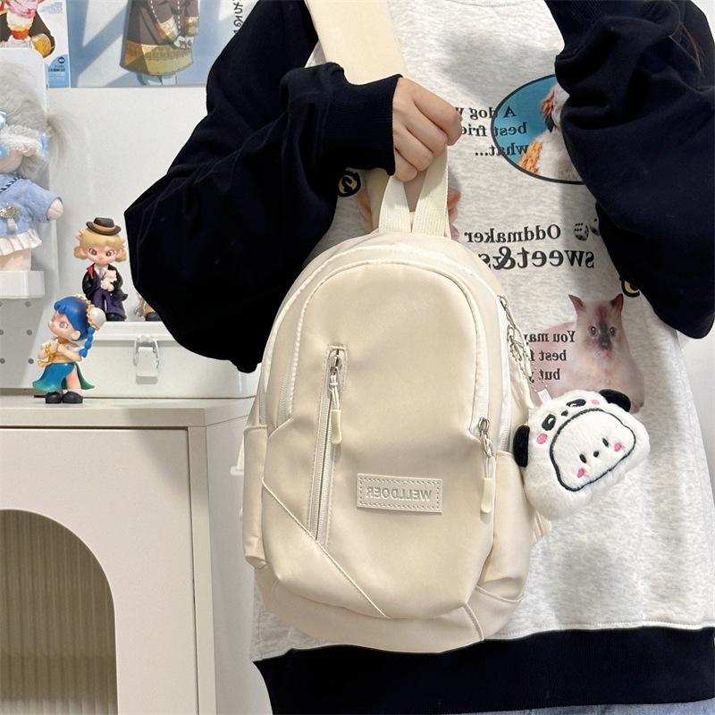 Small fresh student breast bag spring new sweet shoulder bag simple multi-layer versatile casual messenger bag women