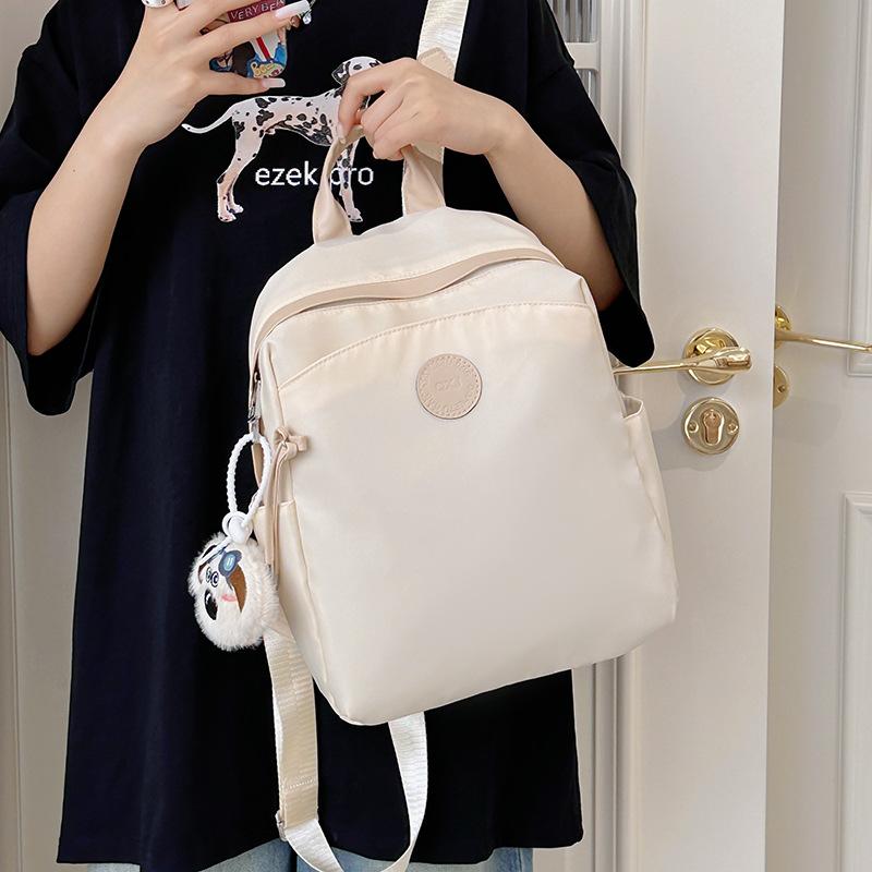 Niche design backpack women's new commuter versatile travel backpack student casual mini schoolbag