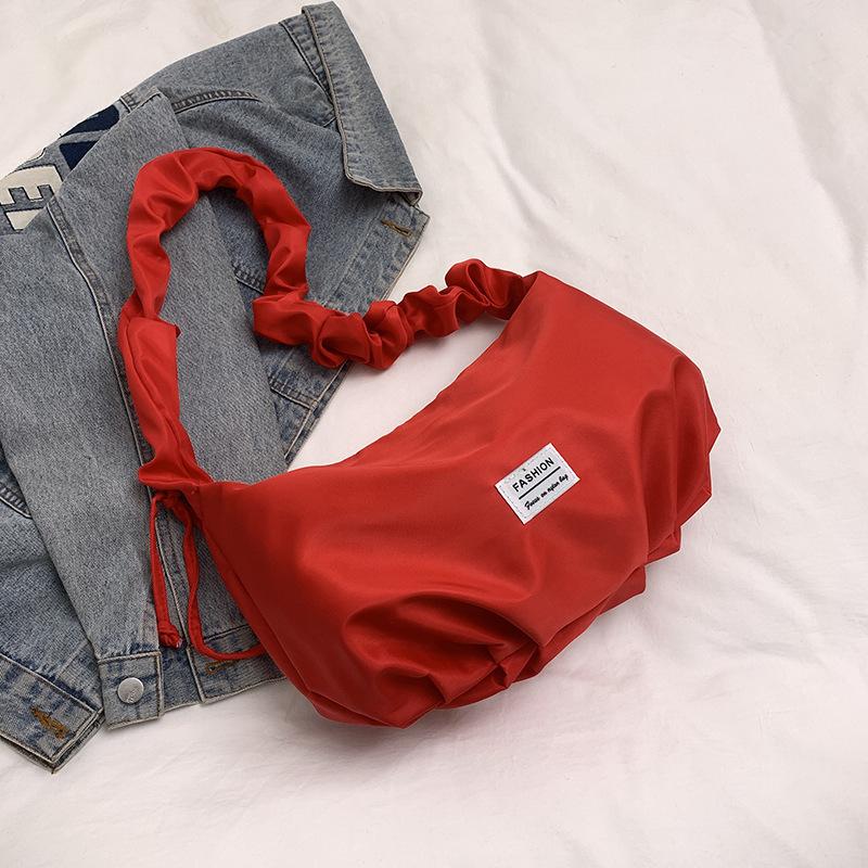 Niche baguette bag women's 2025 spring and summer new high-end shoulder messenger bag pleated cloud underarm bag