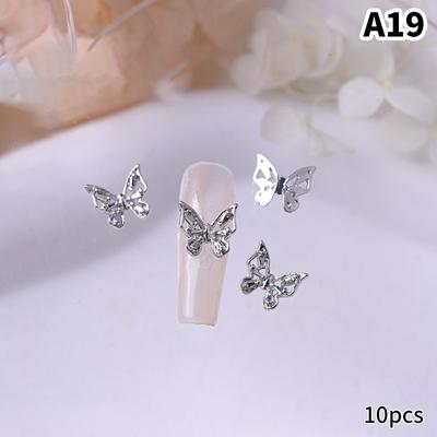 10 τεμάχια/τσάντα σε σχήμα πεταλούδας Nail Star Flower Nail Charm Ασημένιο κράμα νυχιών μαργαριτάρι κοσμήματα Αξεσουάρ Προμήθειες νυχιών