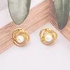 European and American Fashion Twisted Wrap Zinc Alloy Pearl Stud Earrings