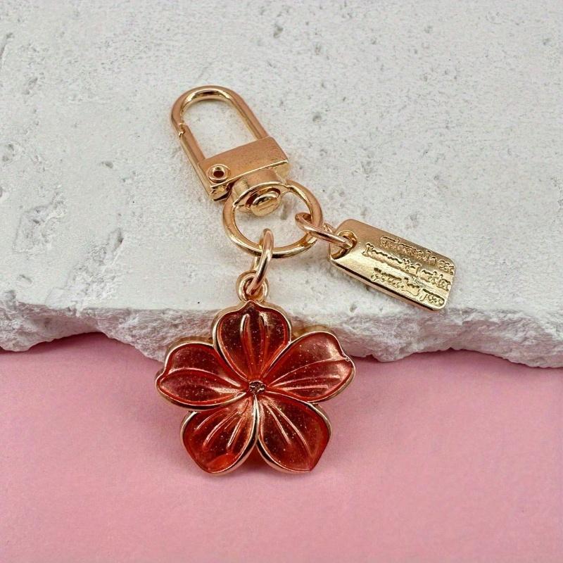 

1pc Metal Sakura Flower Keychain, Lightweight and Graceful Sakura Design with Tag Accessory, Suitable for Bag, Car Keys, Couple & Holiday Gifts розовый