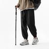 Functional waterproof charging pants spring and autumn loose tied feet casual breathable sports pants outdoor mountaineering trousers