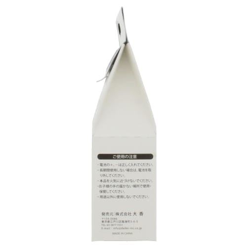 1 white battery-operated candle