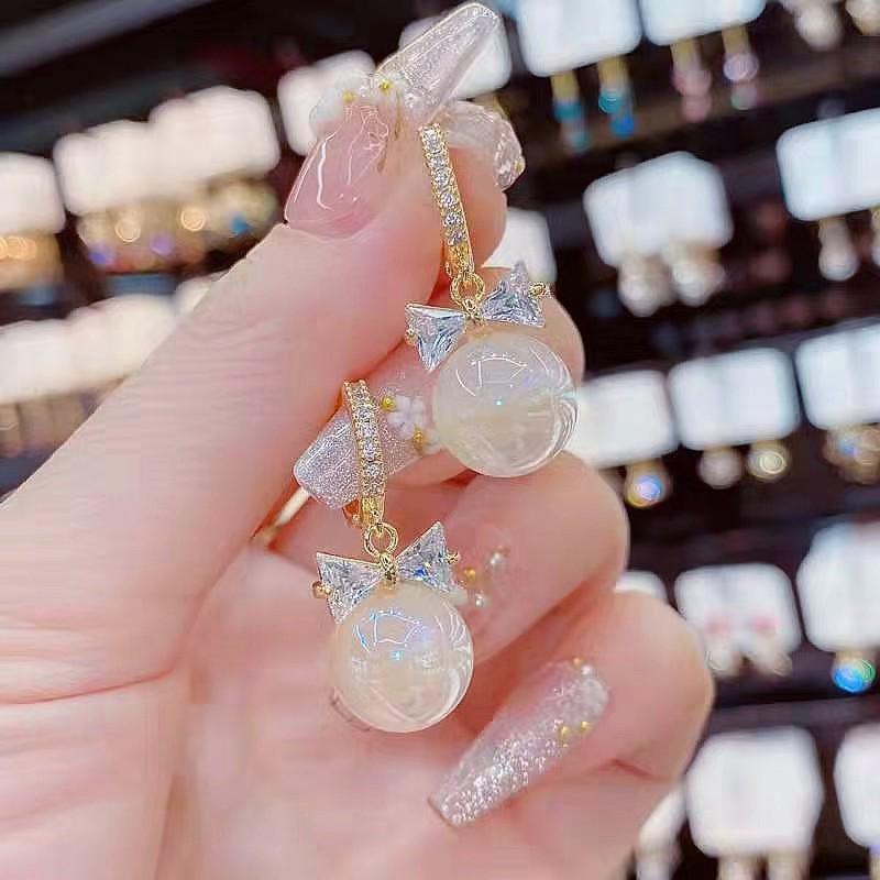 2025 Trendy Bow Knot Mermaid Scale Pearl Earrings
