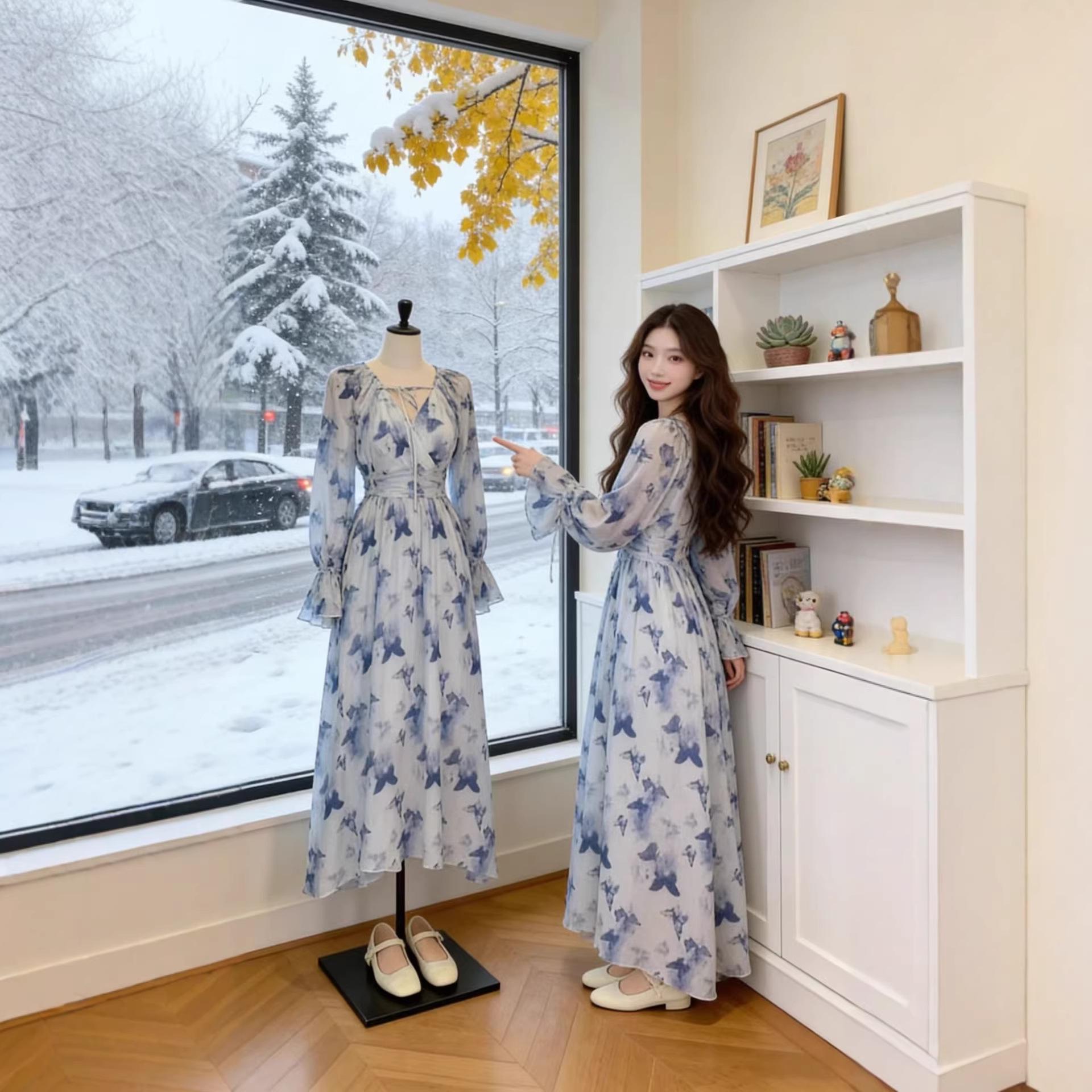 

Elegant Blue V-Neck Dress with Ruffled Sleeves and Waist-Cinching Detail - Perfect for a Spring Afternoon Tea or Vacation. L