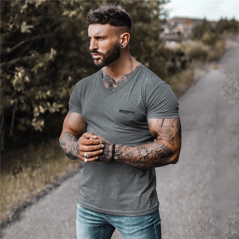 Muscleguys Summer Street Trend Men’s Fashion All-match T Shirts Comfortable Cotton V-neck Short-sleeve Bodybuilding Fitness Tops