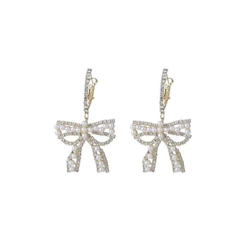 Celebrity bow pearl fringed earrings women's light luxury high-end earrings fashionable exquisite versatile earrings