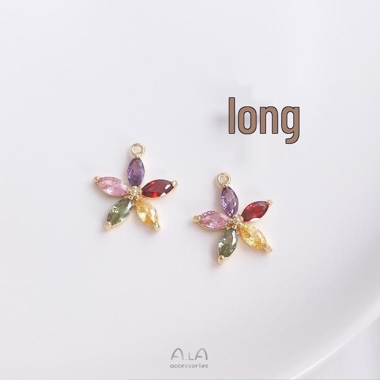 Kolczyki/naszyjnik z zawieszką w kształcie kwiatu z tęczowym okiem, wypełnione 14-karatowym złotem, z kolorowym cyrkoniem.