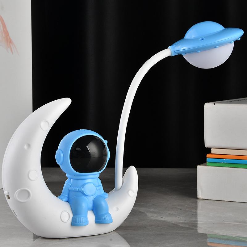 Astronaut LED Night Light: Moon Man Bedside Lamp for Student Dorms, Reading, and Desk Atmosphere.