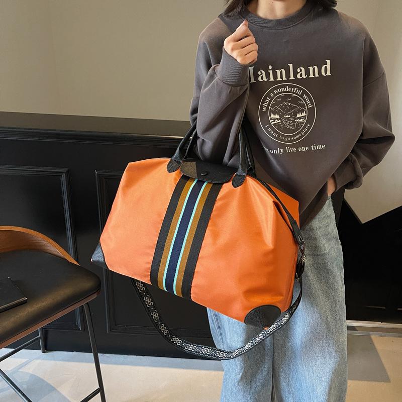 Men's and women's fitness large-capacity ethnic style hand-held travel bag dry and wet separation fashion portable commuter luggage bag