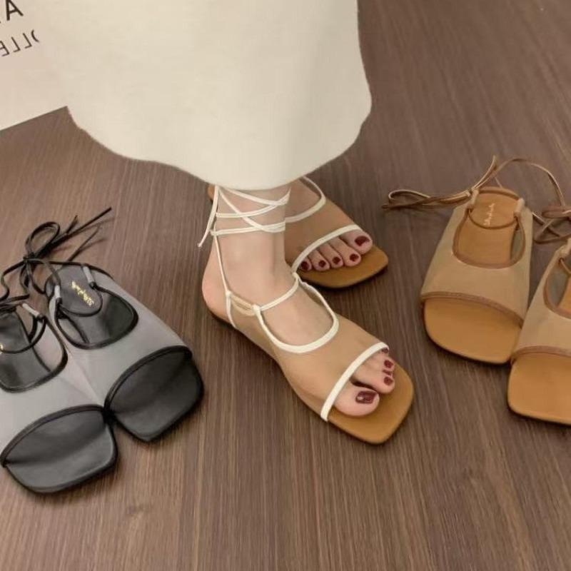Modische Französische Nische Zehenoffene Flache Atmungsaktive Netz-Sandalen für Damen Sommer 2025 Neu Schnür-Casual Strand Römische Schuhe