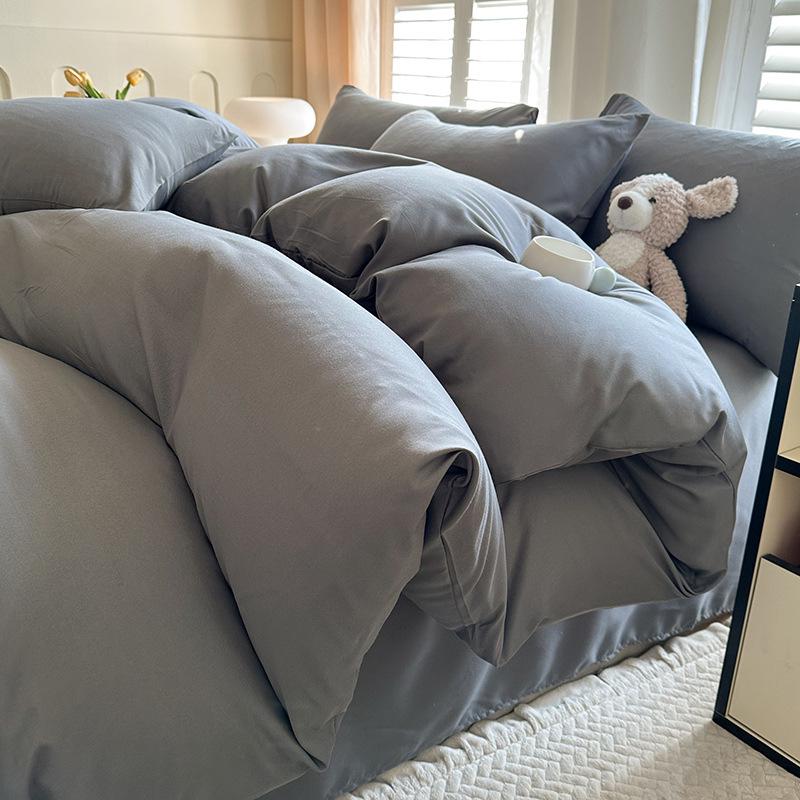 Solid Color Sanded Bedding Set: Four-Piece Set with Quilt Cover and Washed Spring Sheets.