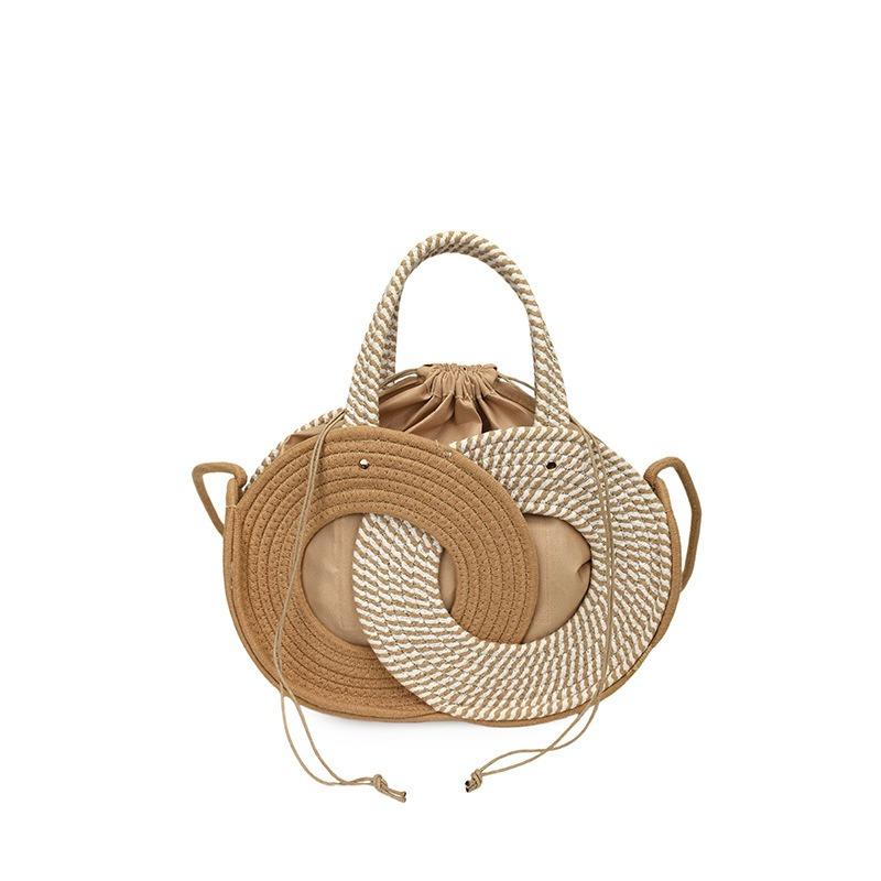 Ms. Wenyuan Is Carrying A Slanted Cross-body Bag with A Tribal Style, Designed for Use On The Beach or At The Seaside.