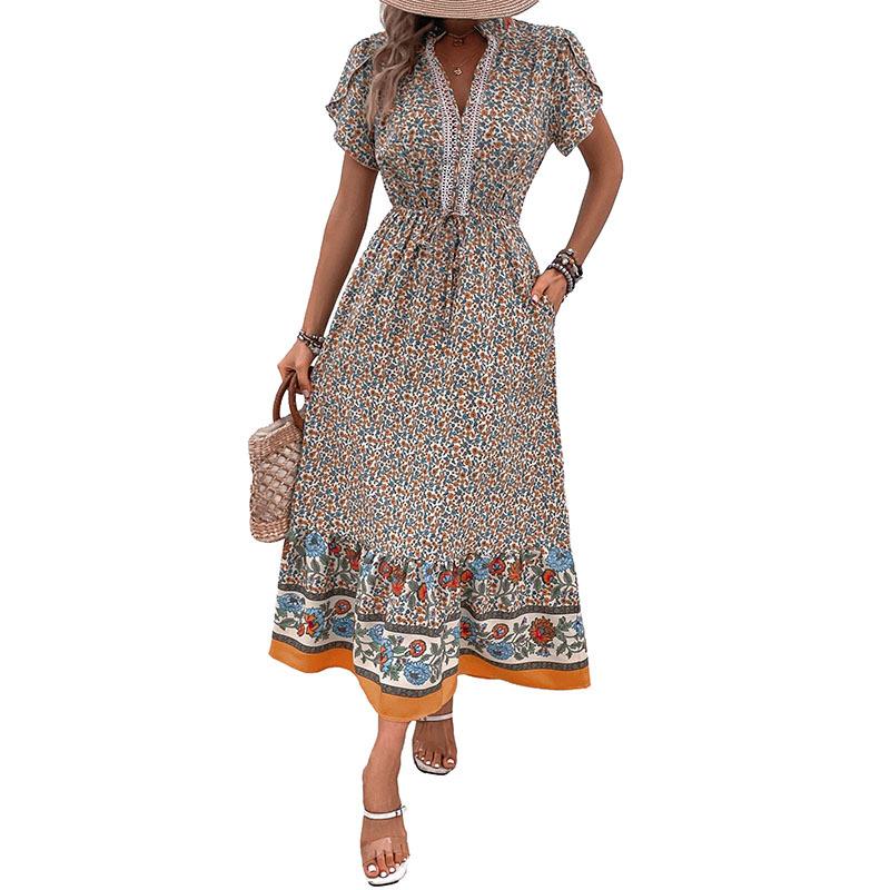 Robe d'été idyllique à volants, manches courtes, motif floral