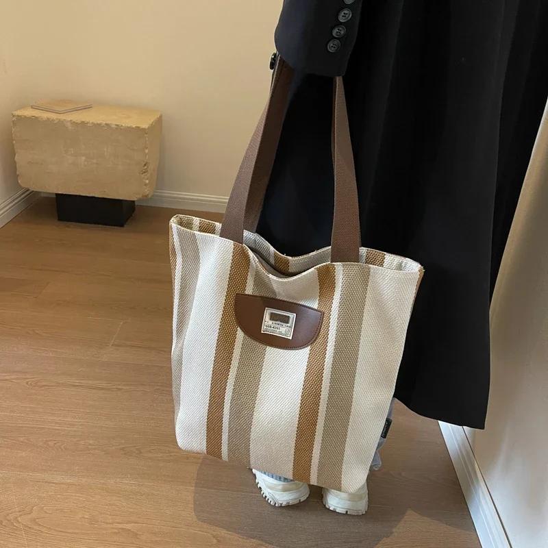 Lediga randiga axelväskor i canvas med dragkedja, stor kapacitet, lyxkänsla, färgmatchande väskor