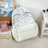Star Print Backpack with Front Pocket and Side Drawstring Pockets for School and Casual Use