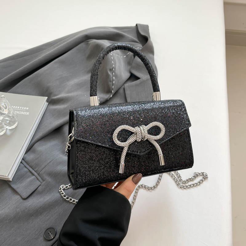 Fashion and simple temperament bow handbag 2025 summer new foreign style shoulder crossbody small square bag