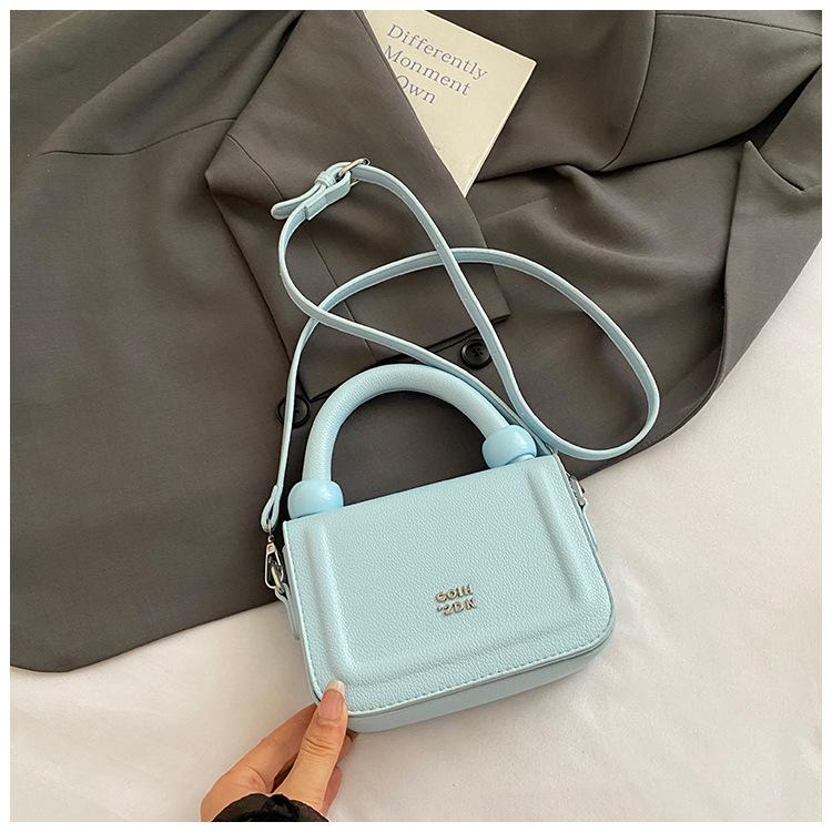 

Exquisite and compact portable work hand bag women s 2025 new light luxury niche high-end messenger small square bag