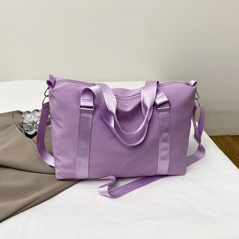 

2025 new travel bag casual large-capacity sports fitness bag women s Korean version shoulder handbag yoga bag фиолетовый