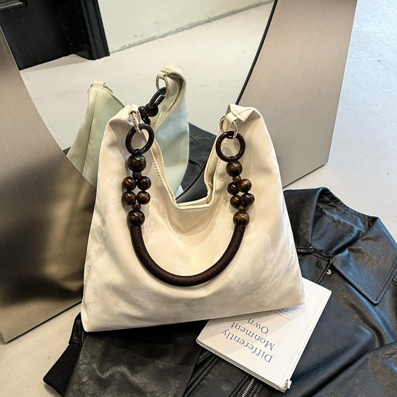 

Trendy women s bags New fashion versatile messenger tote bag Spring and summer women s shoulder armpit bag білий