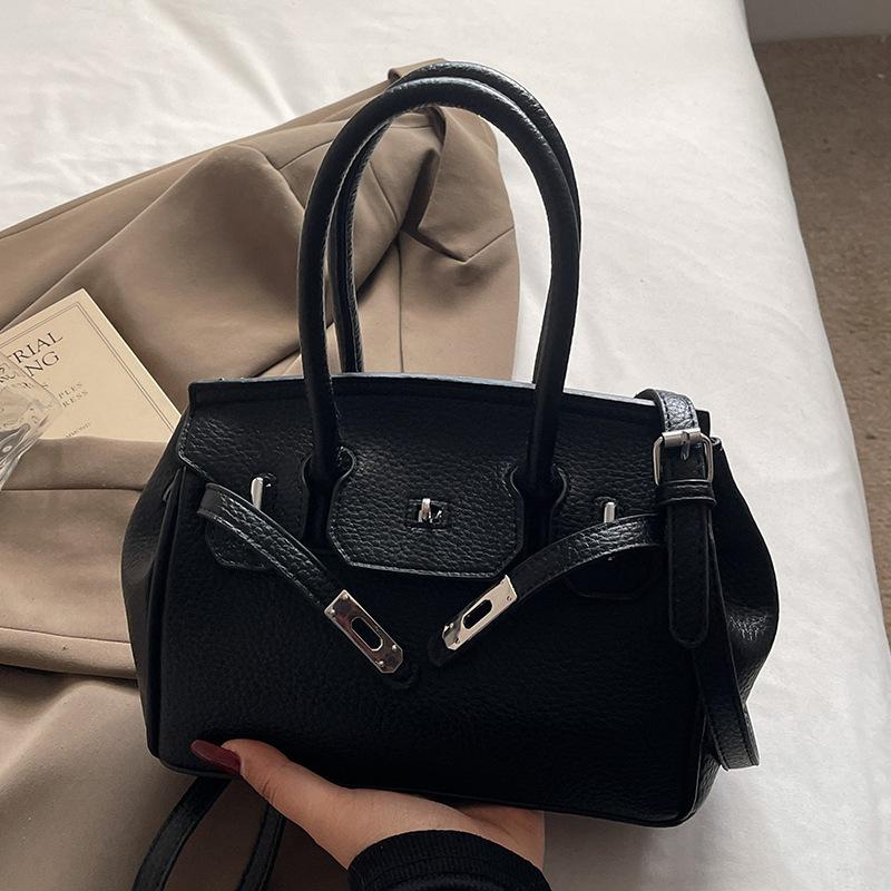 

Korean version of foreign style commuter style advanced sense lychee pattern portable Kelly bag temperament versatile fashion solid color messenger w