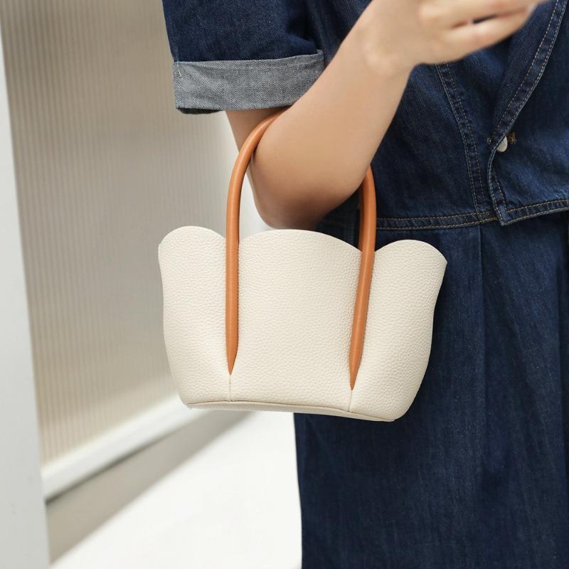 New Petal-type Niche One-shoulder Messenger Bag, Lychee Pattern Cowhide Hand-carried Portable Bucket Bag.