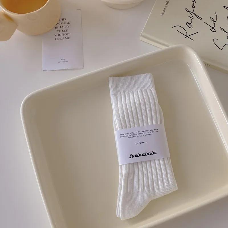 Chaussettes en Tricot de Coton pour Femmes Style Japonais Chaussettes Hautes pour Écolières Mode Coréenne Couleur Unie Noir Blanc Gris Chaussettes Longues