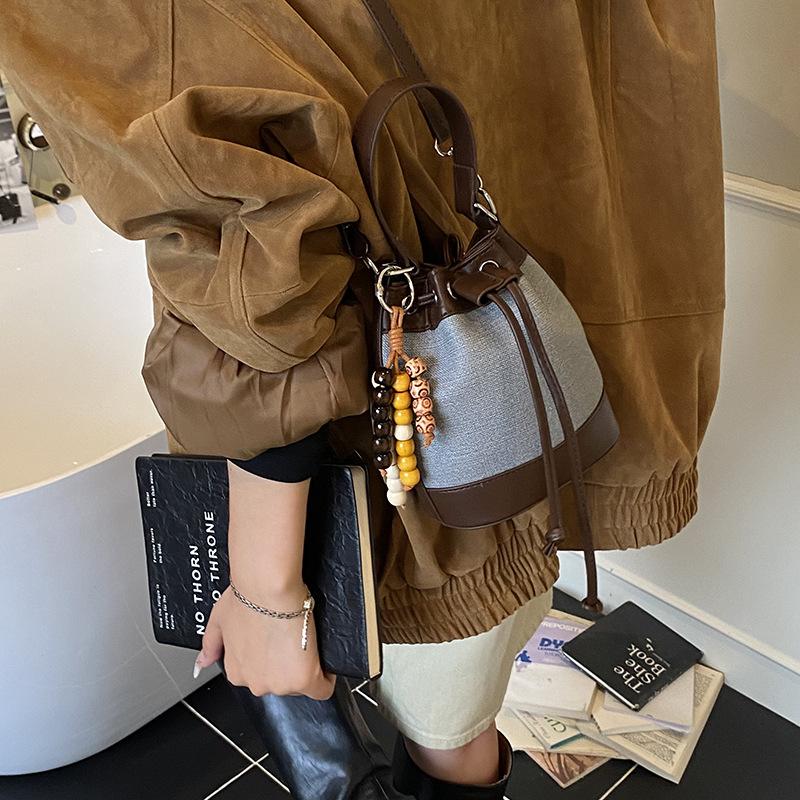 Premium handbag bag women's 2025 new autumn and winter shoulder versatile messenger bag Korean version drawstring hand carrying bucket bag