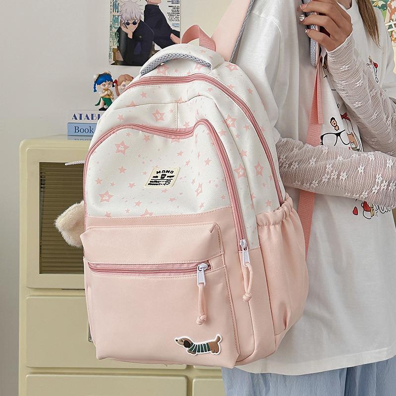 

High-value schoolbag female student large-capacity printed backpack cute junior high school student spine protection student backpack рожевий