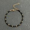 Nouvelle arrivee: Ensemble collier et bracelet faits main en perles de cristal noir pour femmes avec perles dorées - Élégant, Polyvalent, Style Célébrité